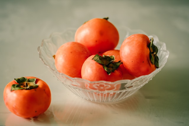 Sharon or Persimmon fruit growing